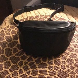 Small adjustable leather fanny pack.